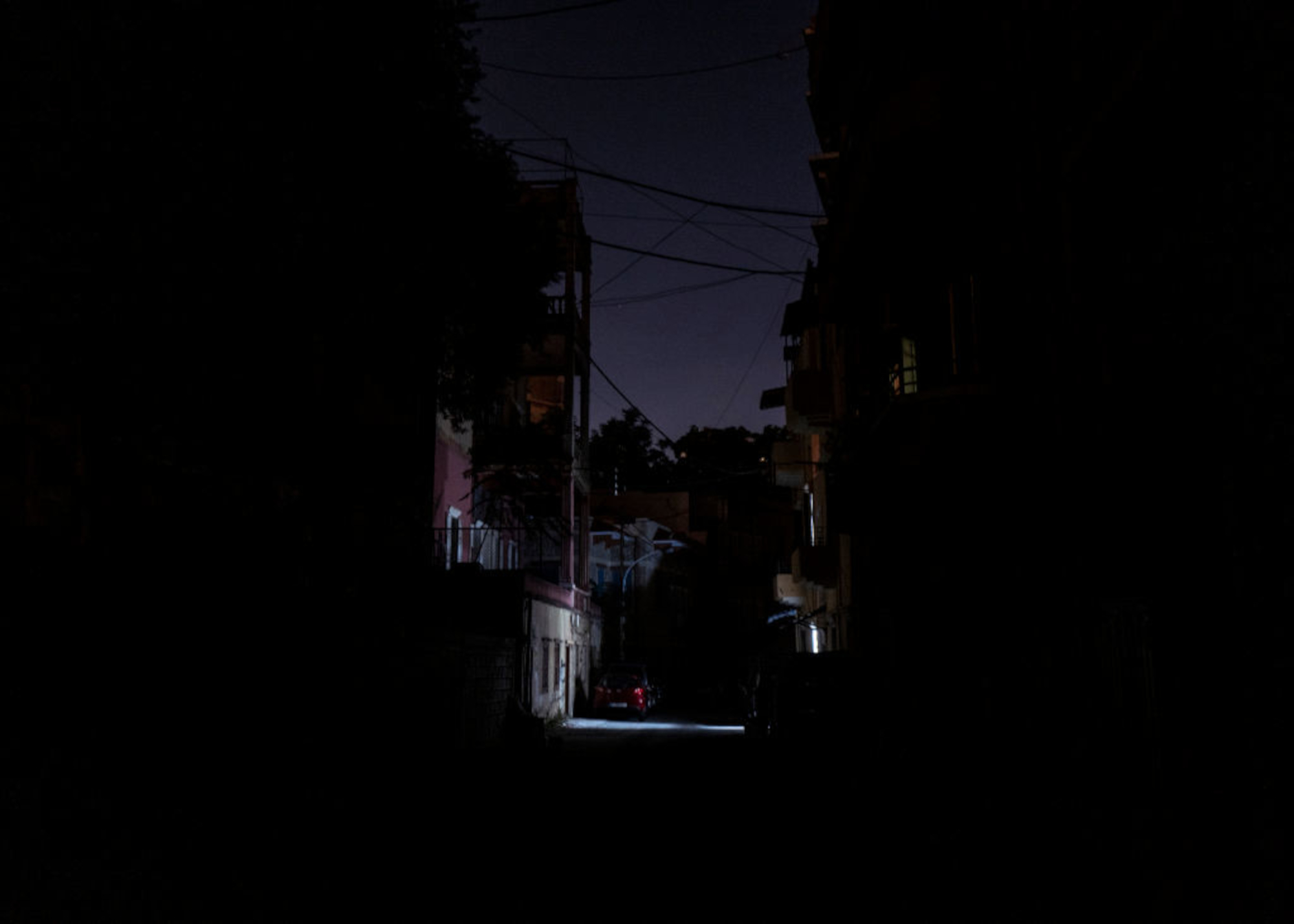 An empty and dark street on July 11, 2021 in Beirut, Lebanon. (Photo by Rafael Yaghobzadeh/Getty Images)