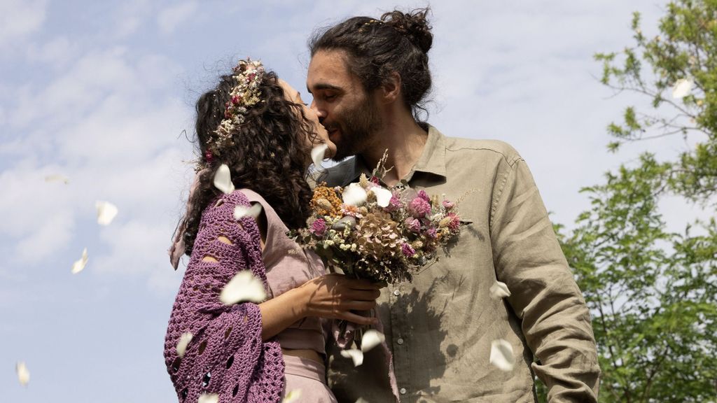 Eco-friendly couple spent just $3.6k on a 'zero-waste wedding' - complete with a recycled fabric dress and leaf confetti. (Anna Masiello, SWNS/Zenger)