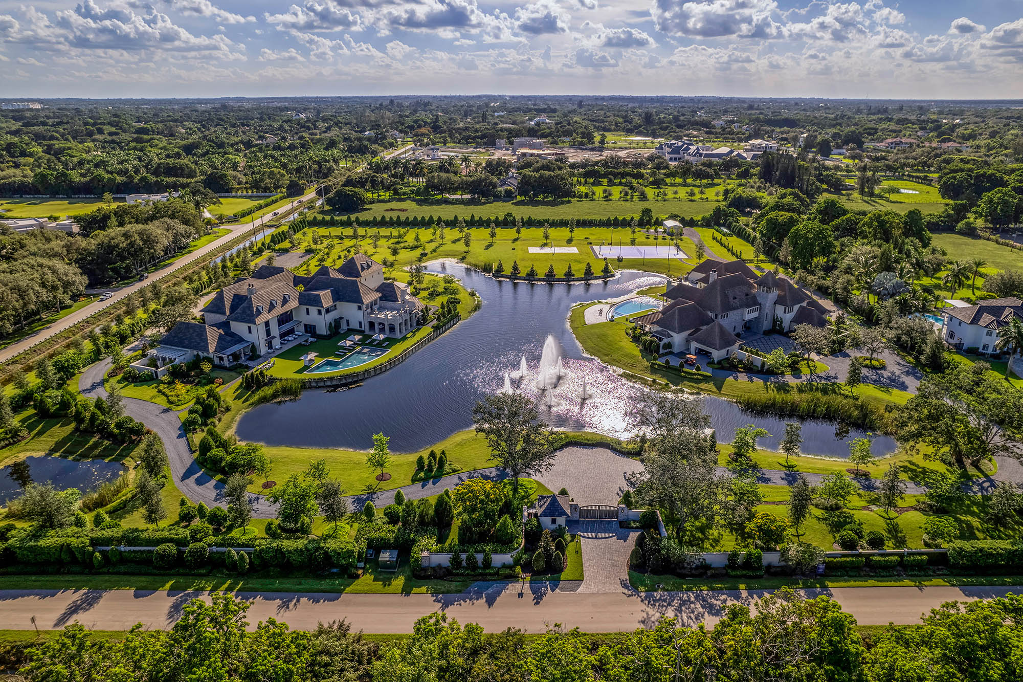 Drone pictures show the two French country-style mansions built side by side for identical twins which are currently on the market for $54 million. Undated photograph. (The Jills Zeder Group,1 Oak Studios,SWNS/Zenger)