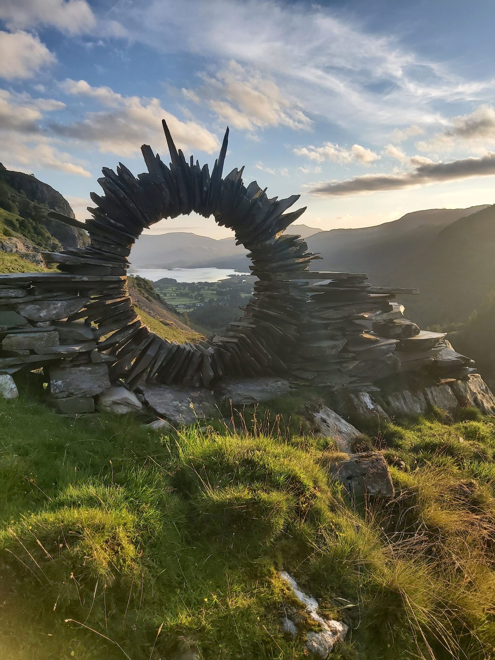 Pictures show an amazing piece of artwork made out of slate, created by a mystery artist who has now been dubbed the 'Borrowdale Banksy'. Daniel Farrington, 30, and wife Agnieszka, 34, came across the slate ring in Borrowdale, Cumbria,. around sunrise on Monday, August 1, 2022. (Daniel Farrington,SWNS/Zenger)
