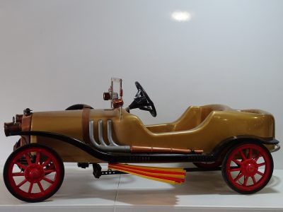 An extremely rare model of a Chitty Chitty Bang Bang child’s pedal car, which sold for nearly $2k at an auction held on August 16, 2022. The miniature toy vehicle was made in Italy in 1967 at the famous Pines factory and is in good condition. (James Dadzitis, SWNS/Zenger)