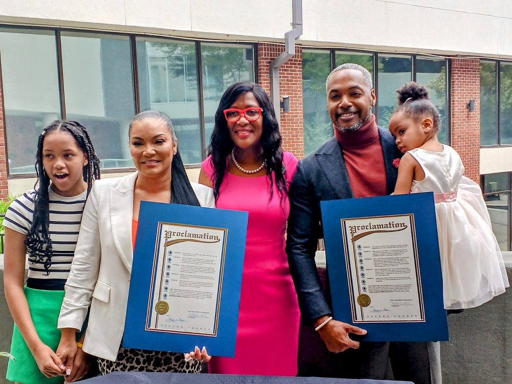 Egypt Sherrod and Mike Jackson honored by Fulton County Commissioner  Natalie Hall (Photo by Terry Shropshire for rolling out)