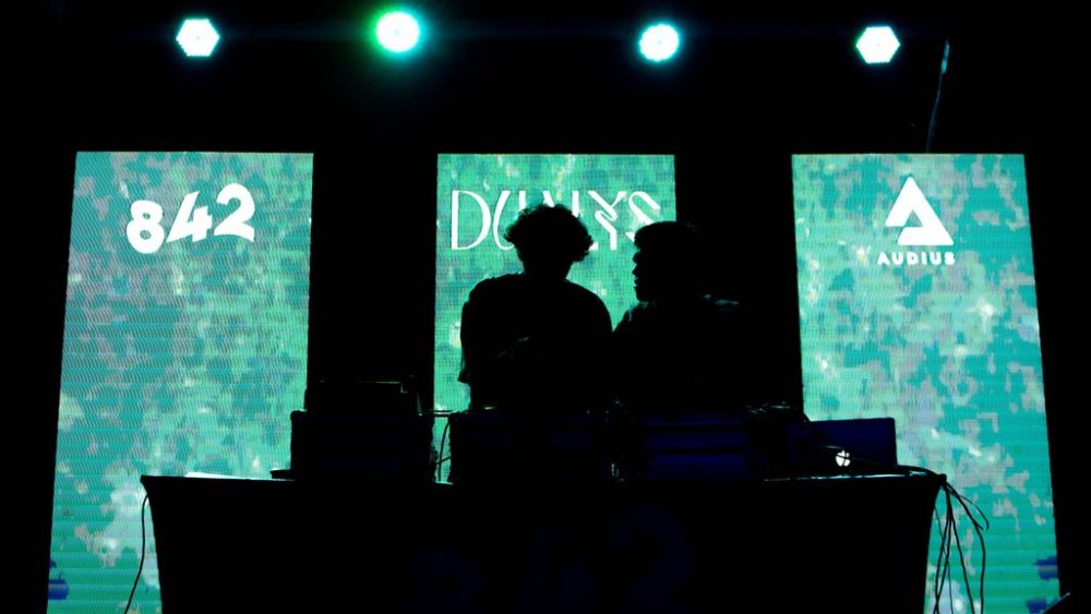 Audius artists perform at a small arts festival in Chile around NFTs. (Courtesy of @842collective, @goininside and @showmelights from Audius.)