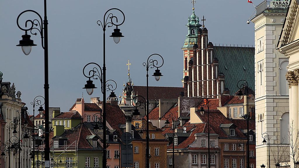 Ornate lampposts decorate the way towards buildings, including St. John's Cathedral, in the city's Old Town on April 12, 2010 in Warsaw, Poland.  (Photo by Sean Gallup/Getty Images)