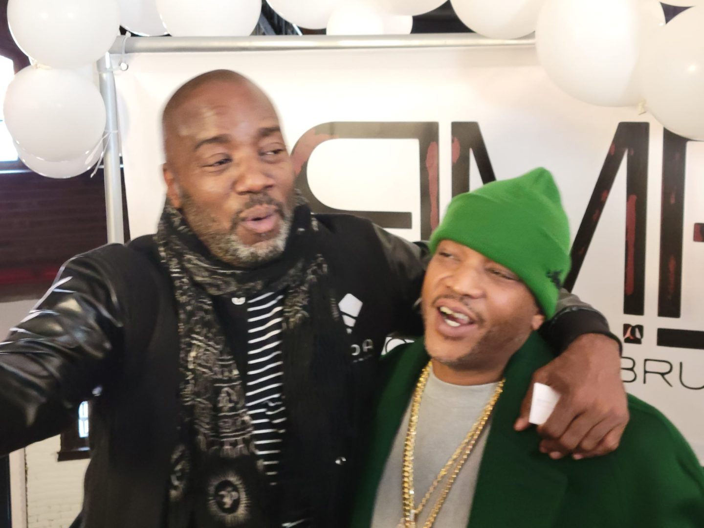 Actor Malik Yoba and hip-hop artist Styles P share a laugh in Brooklyn (Photo by Derrel Jazz Johnson for rolling out)