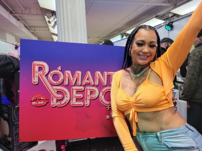 Donna Lombardi discusses her anti-violence campaign at the Romantic Depot both at the Sex Expo in New York City (Photo by Derrel Jazz Johnson of rolling out)