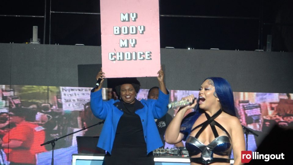 Stacey Abrams holds sign on stage as Latto raps about Roe v. Wade (photos)