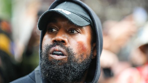 PARIS, FRANCE - OCTOBER 02: Kanye West aka Ye is seen wearing a Balenciaga boxing mouthguard in Paris, France, on October 2, 2022. It was outside Givenchy, during day seven of Paris Fashion Week. EDWARD BERTHELOT/GC IMAGES 