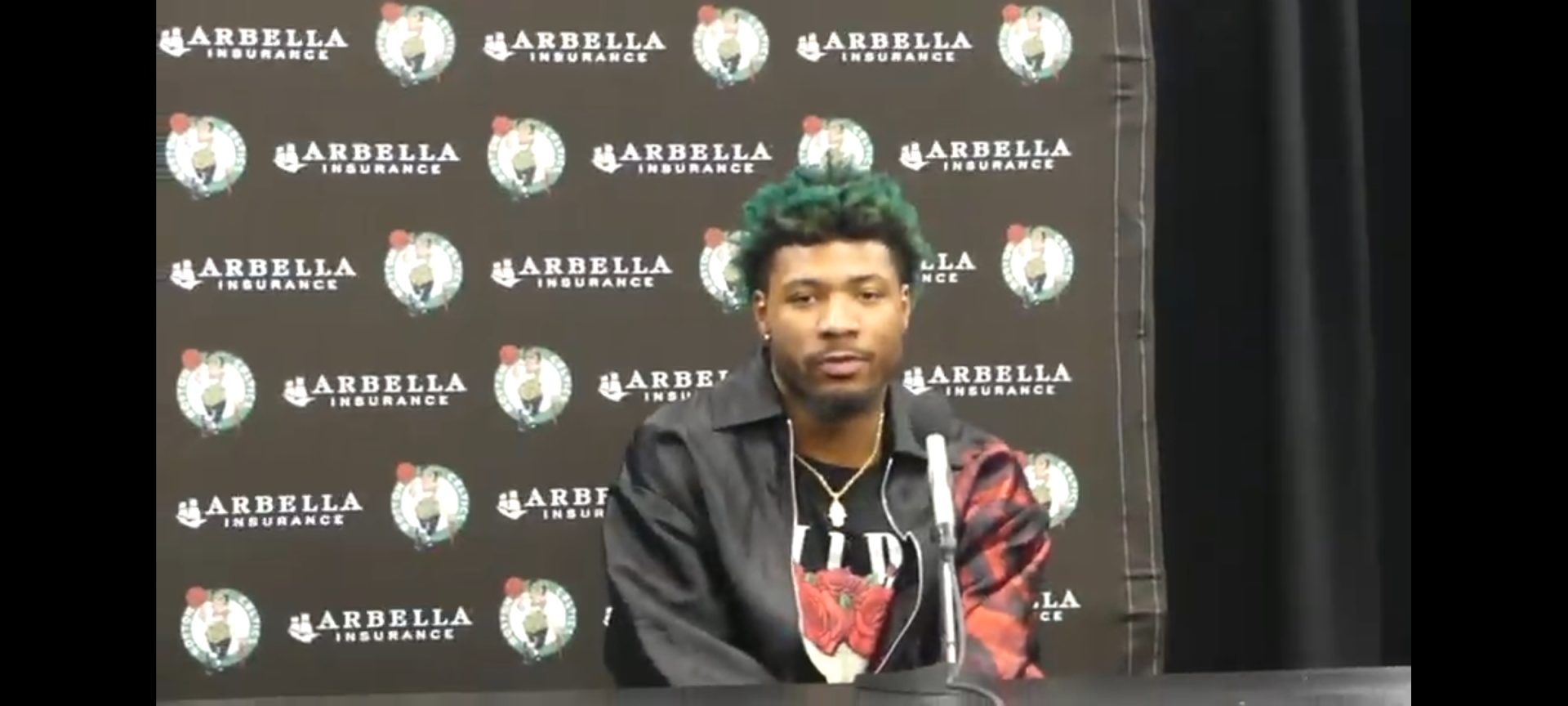 Marcus Smart speaks with the media after a Boston Celtics game (Photo by Derrel Jazz Johnson for rolling out)