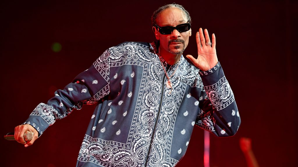 Snoop Dogg of hip-hop supergroup Mt. Westmore performs at Rupp Arena on November 20, 2021, in Lexington, Kentucky. Hestrong /strongwill be the subject of a biopic from Universal Pictures, which may finally answer his popular song title: “Who Am I?” STEPHEN J. COHEN/GETTY IMAGES 