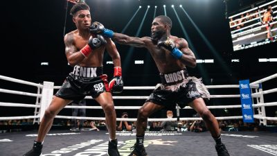 strongFrank Martin (right) registered ninth and final round knockdowns during a 10th-round TKO of Jackson Marinez (left) in July. Martin is after his third straight knockout victory in  Saturday's 135-pound clash of unbeaten fighters against Michel Rivera.  RYAN HAFEY/PREMIER BOXING CHAMPIONS/strong 