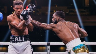 Frank Martin (right} lands a long left hand on Michel Rivera (left) on the way to winning a 135-pound clash of unbeaten by near-shutout 12-round unanimous victory.  ESTHER LIN/SHOWTIME 