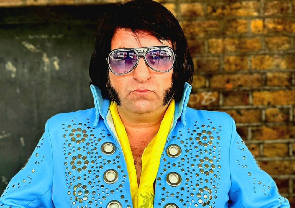 Former bus inspector David Black, 52, spends $12k of his money on Elvis Presley outfits and singing lessons to fulfill his dream of becoming an impersonator. Black dreamed of being Elvis at the age of 10. DAVID BLACK/SWNS TALKER