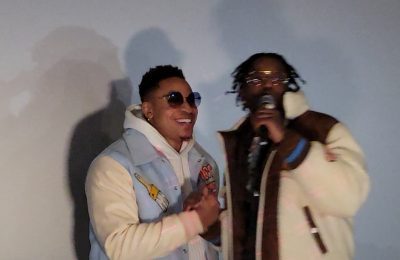 Rotimi and DC Young Fly speak to the crowd at a New York City movie theater. (Photo by Derrel Jazz Johnson for rolling out.)