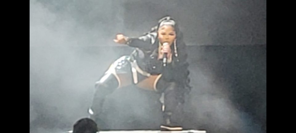 Lil Kim performing at the Apollo Theater in Harlem. (Photo by Derrel Jazz Johnson for rolling out.)