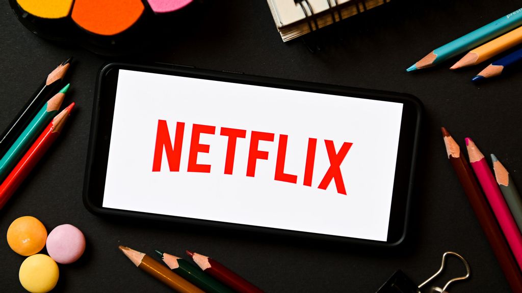 In this photo illustration a Netflix logo seen displayed on a smartphone. The streaming wars continue to heat up with many players battling for subscribers and revenue. SOPA IMAGES/BENZINGA