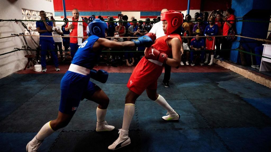 Cuban boxers fight during the first official women's boxing program in Cuba at the Giraldo Cordova boxing school in Havana, on December 17, 2022.  Cuban female boxer now can officially punch in the boxing ring after Cuban authorities allow women to compete in boxing. YAMIL LAGE/AFP via GETTYIMAGES