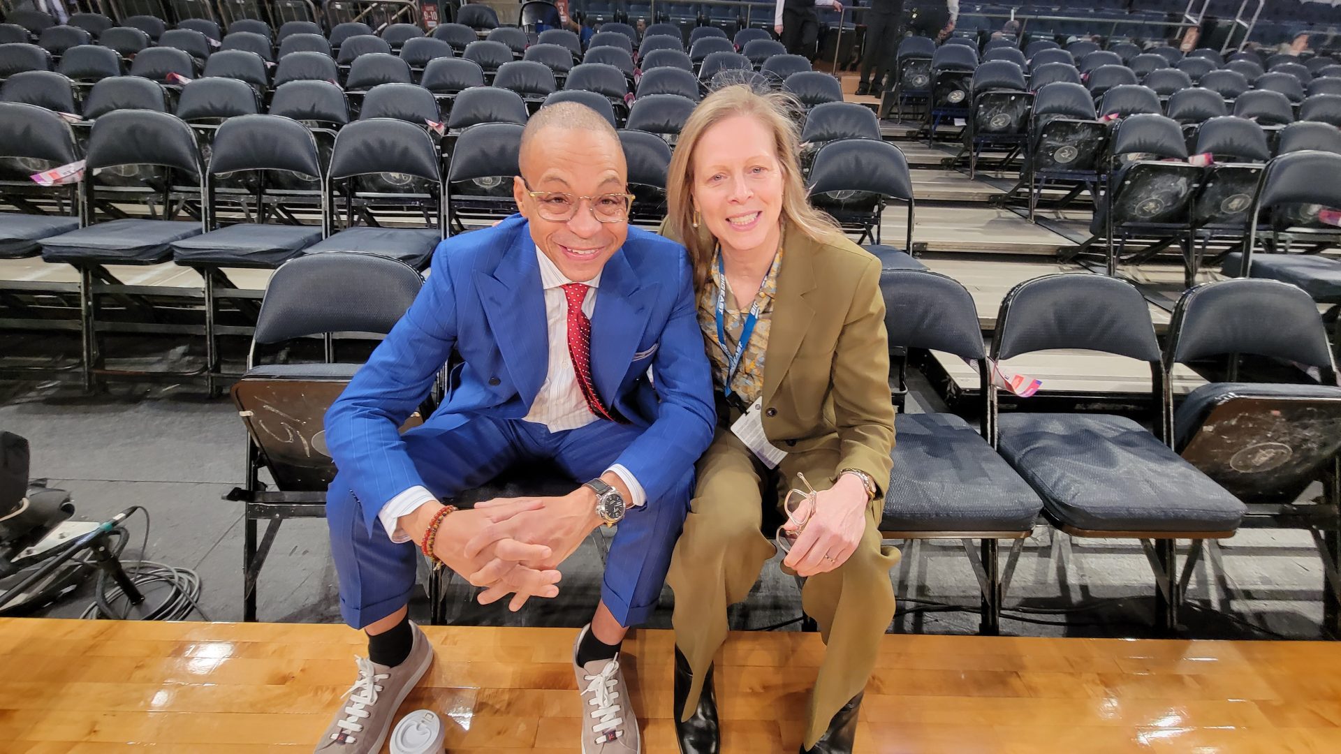 Fox Sports play-by-play announcer Gus Johnson with Big East Conference commissioner Val Ackerman. (Photo by Derrel Jazz Johnson for rolling out.)