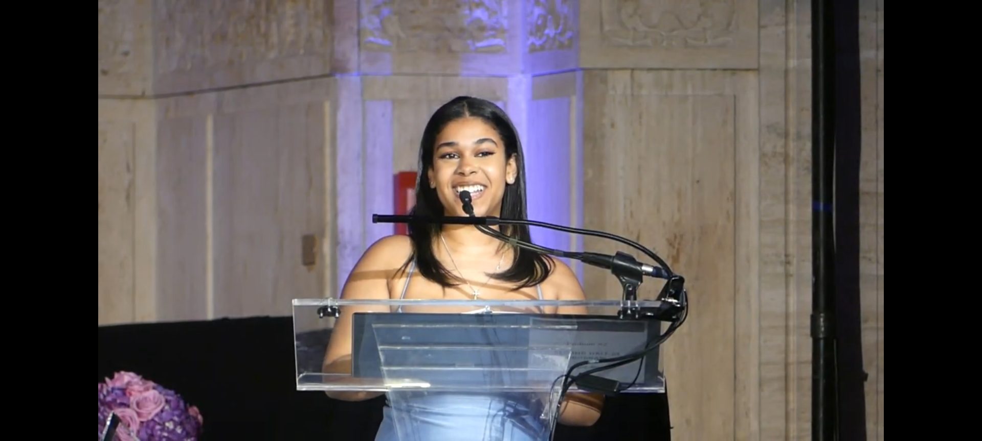 Aisha Beltran accepts the Carrie Terrell Youth Achiever Award. (Photo by Derrel Jazz Johnson for rolling out.)