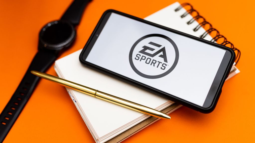 In this photo illustration a EA Sports logo seen displayed on a smartphone. EA's previous Star Wars game sold 8 million units in just a month and a half and 10 million units in four and a half months.  MATEUSZ SLODKOWSKI/BENZINGA