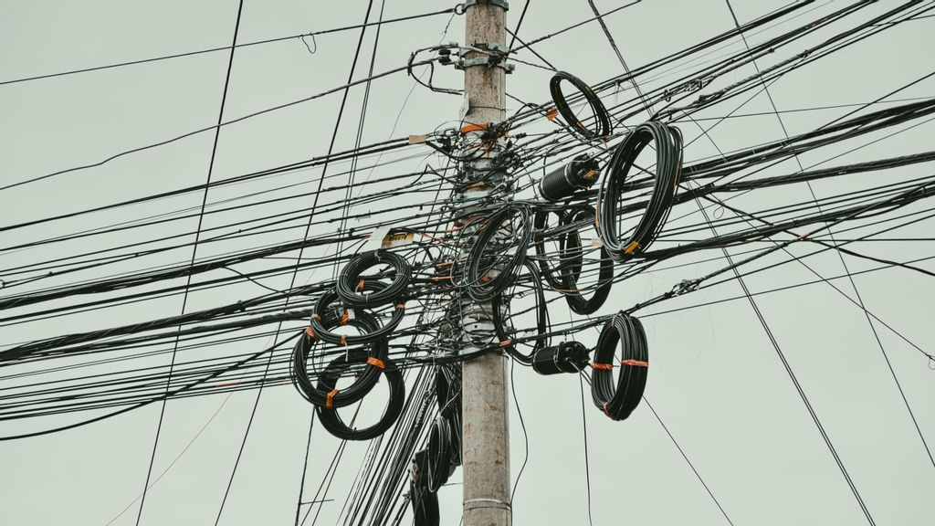 Photos of telecommunication wires. Thousands of toxic cables have been left behind by telecommunications companies over the years, posing a health risk for surrounding communities. RAVI AVAALA/UNSPLASH. 