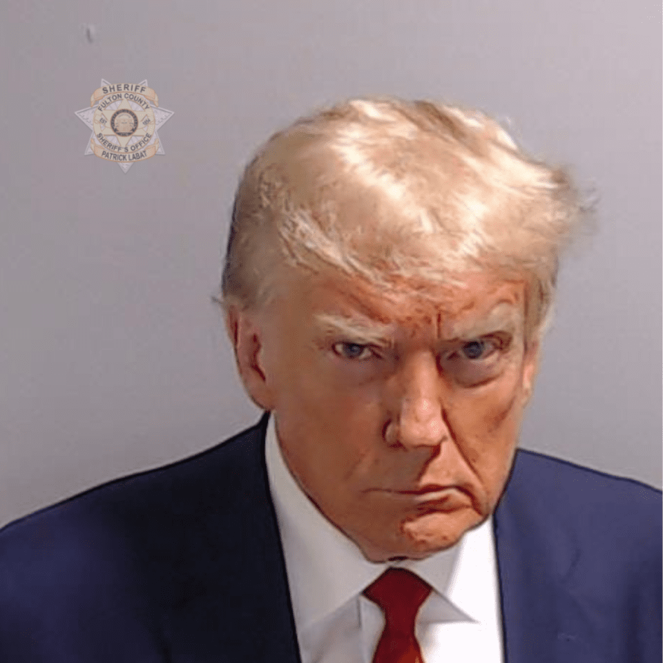 Say what? Trump supporters compare his mug shot to MLK's (photos )