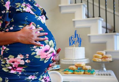 Conceptual,Close,Up,Photo,Of,Pregnant,African,American,Woman,Celebrating