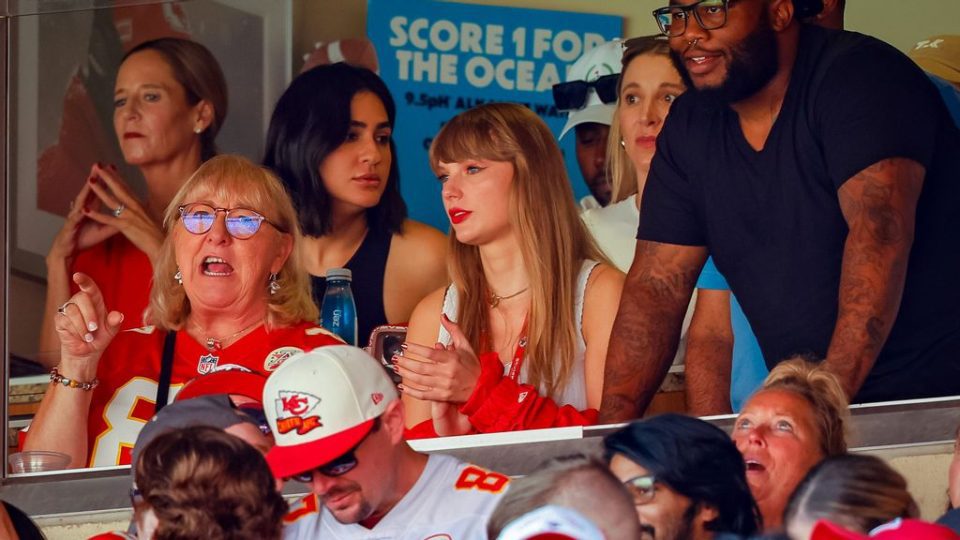 Taylor Swift watches a regular season game between the Kansas City Chiefs and the Chicago Bears with Donna Kelce, mother of Kansas City Chiefs tight end Travis Kelce, at GEHA Field at Arrowhead Stadium on September 24, 2023 in Kansas City, Missouri. DAVID EULLIT/GETTY IMAGES. 