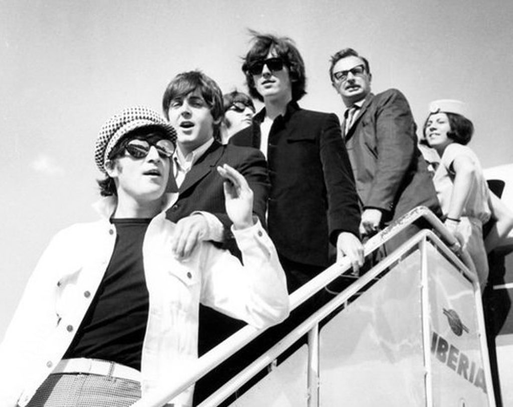 The Beatles in 1965. IBERIA AIRLINE VIA WIKIMEDIA COMMONS.