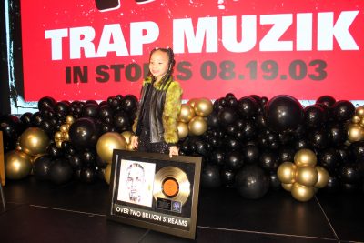 T.I. honored by his children at 'Trap Muzik' album's 20th anniversary (photos)