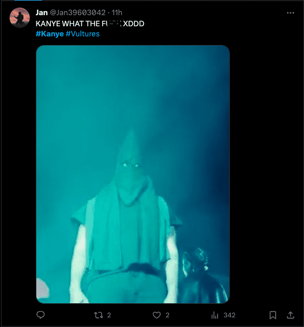 Kanye West flamed by fans for wearing a black KKK hood onstage (photos)
