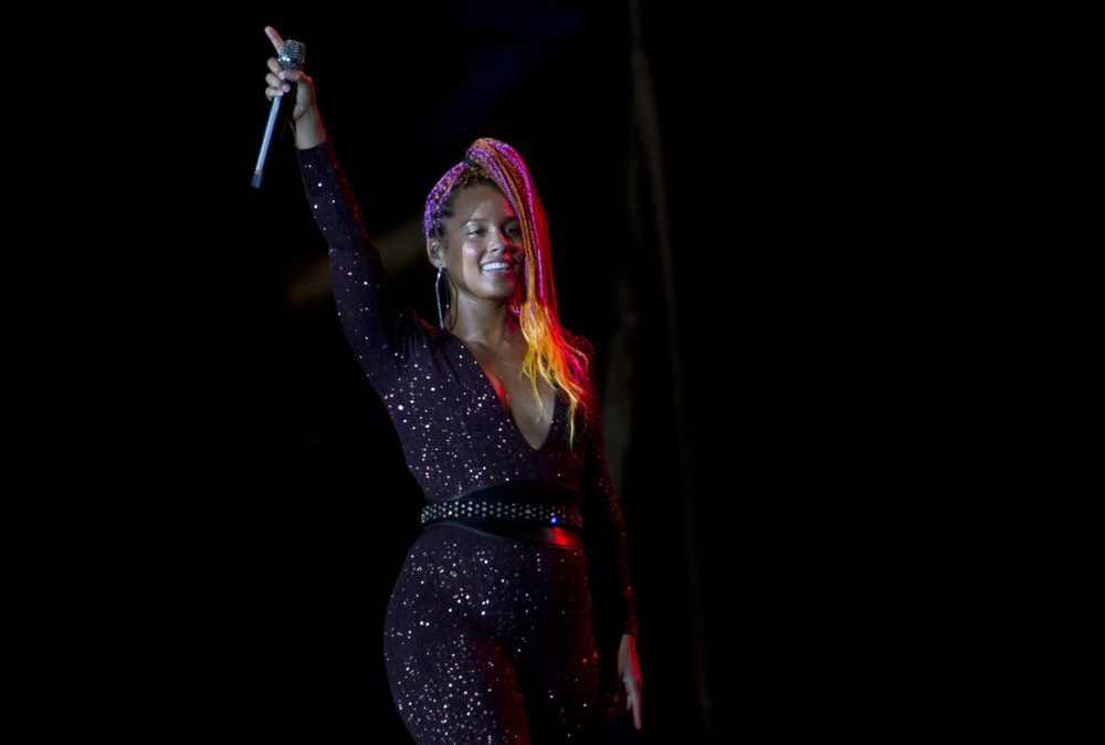 Alicia Keys. at a performance. (Photo credit: Shutterstock.com/Antonio Scorza.)