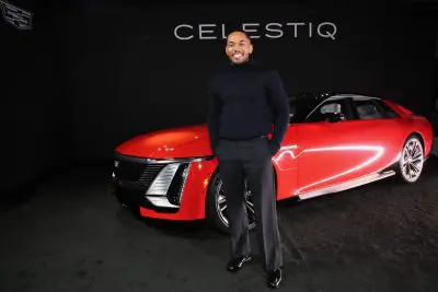 Kelvin Harrison, Jr positioned in front of the Cadillac CELESTIQ