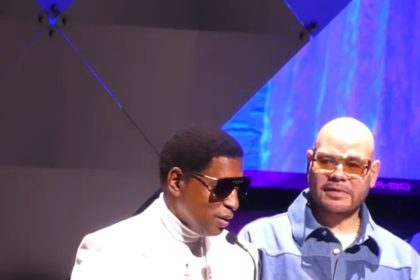 Fat Joe looks on as Babyface gives his acceptance speech after receiving the inaugural Legacy Award at the Apollo Spring Benefit, which was presented by Fat Joe (Photo by Derrel Jazz Johnson for rolling out)