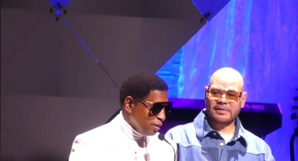 Fat Joe looks on as Babyface gives his acceptance speech after receiving the inaugural Legacy Award at the Apollo Spring Benefit, which was presented by Fat Joe (Photo by Derrel Jazz Johnson for rolling out)