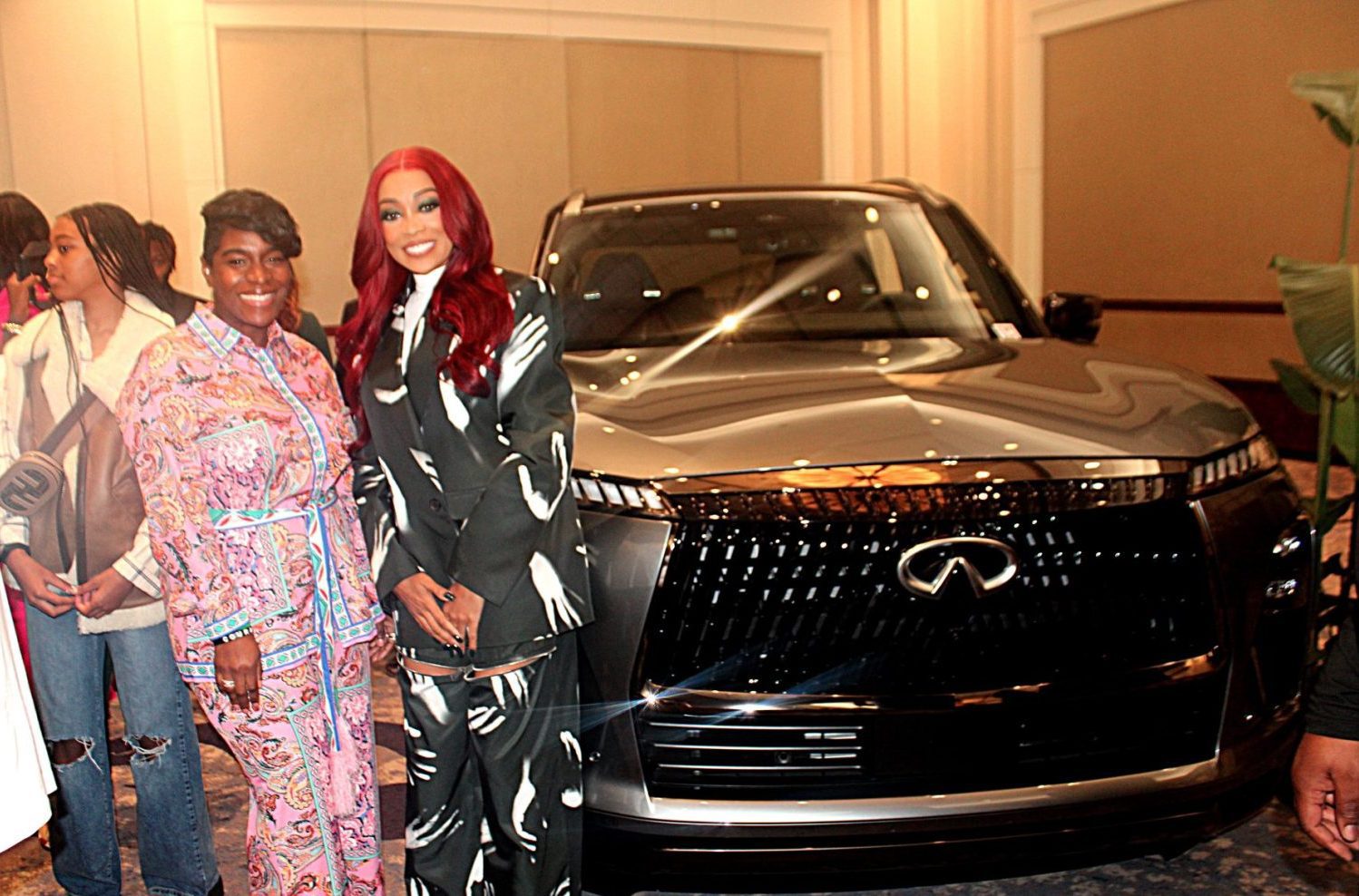 Singer Monica with Ashli C. Bobo Director, Communications INFINITI Americas (photos by Terry Shropshire for rolling out)