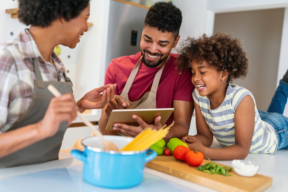 African American family cooking food