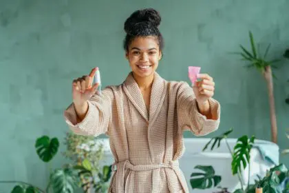 lady holding a menstrual cup