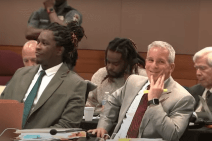 Attorney Brian Steel, right, sitting next to Young Thug