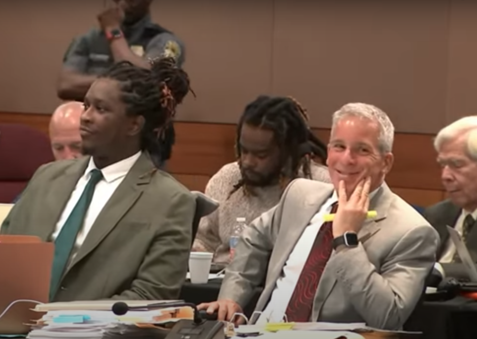 Attorney Brian Steel, right, sitting next to Young Thug