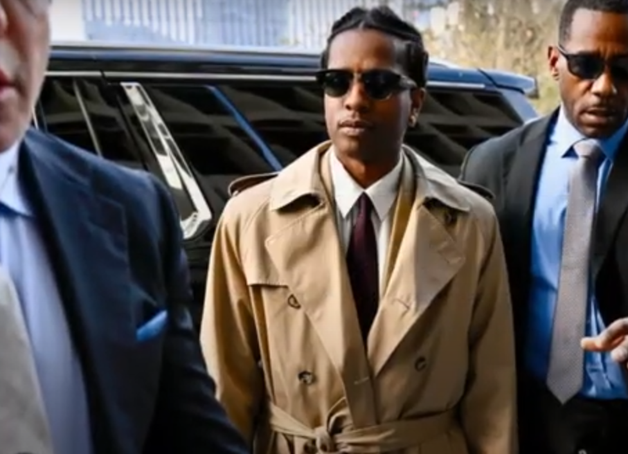 A$AP Rocky walking into his trial rocking Ray-Bans