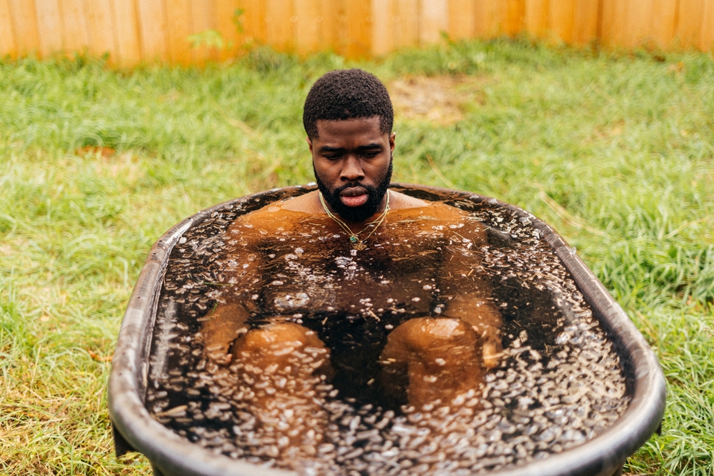 African American man doing Cold exposure therapy