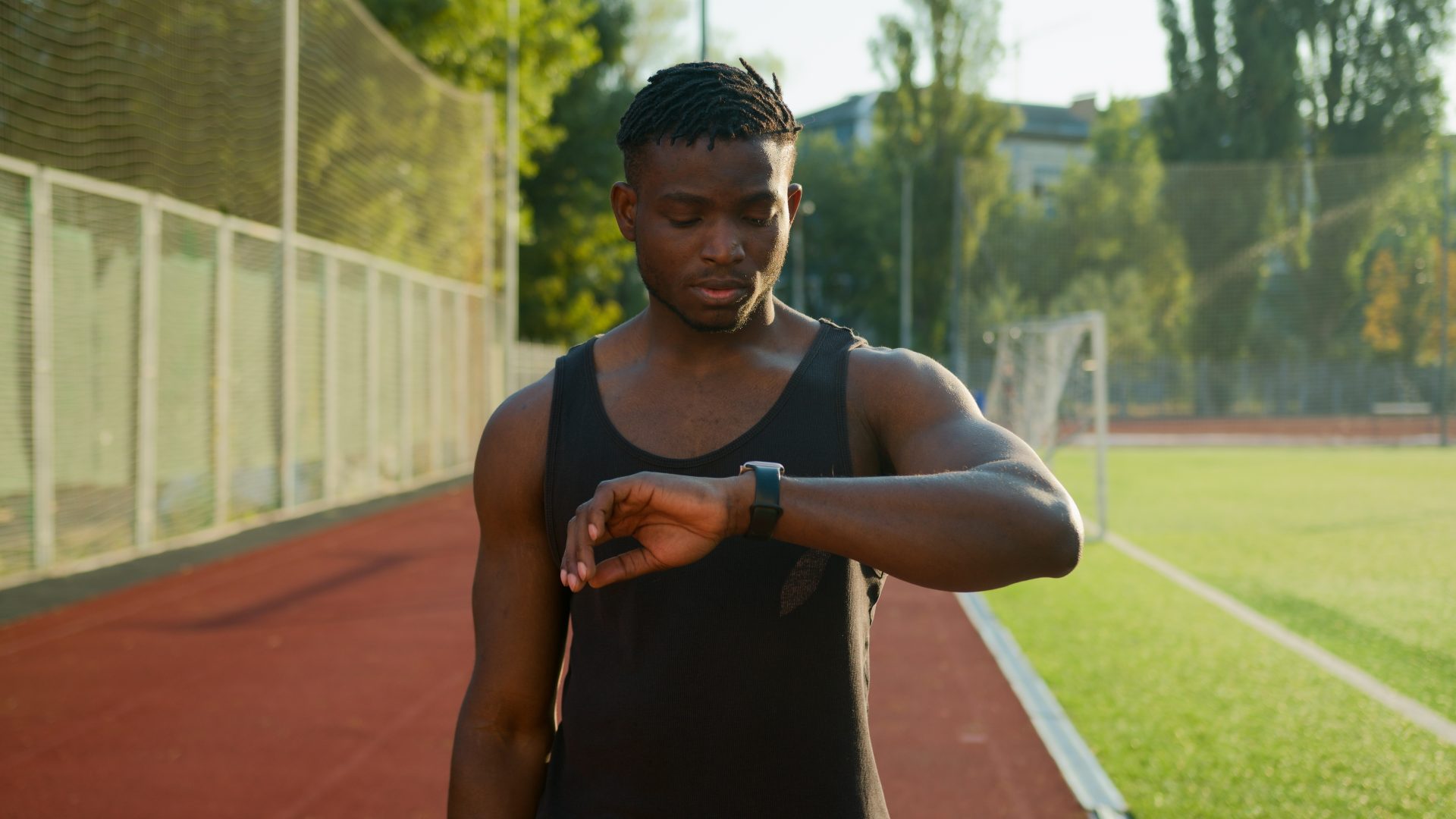 African American man monitoring his heart rate