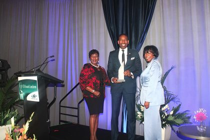 Atlanta Mayor Andre Dickens, center