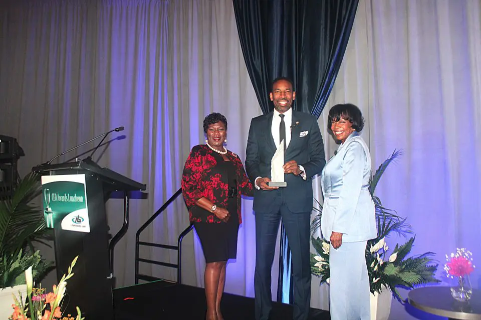 Atlanta Mayor Andre Dickens, center