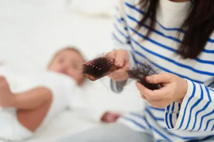 postpartum hair loss, hormonal changes, new motherhood